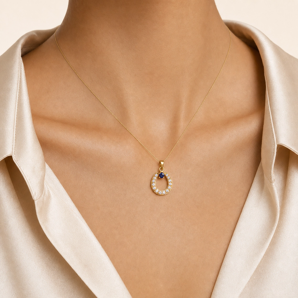 Blue Sapphire Horseshoe Pendant